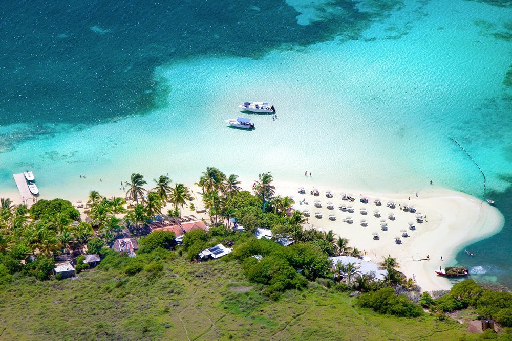 The beach on the western tip of Pinel Island, jutting into Cul-de-Sac Bay, illustrates the more unspoilt nature of St Martin
