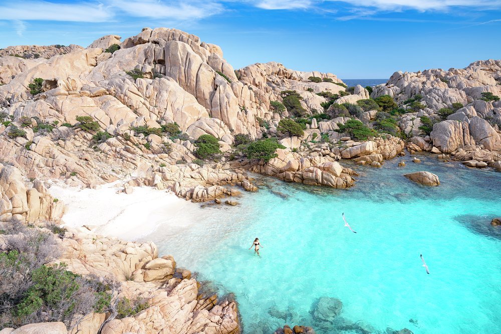 The smooth granite, white sands and turquoise waters of the Maddalena Archipelago off the north east coast of Sardinia are a yachting paradise