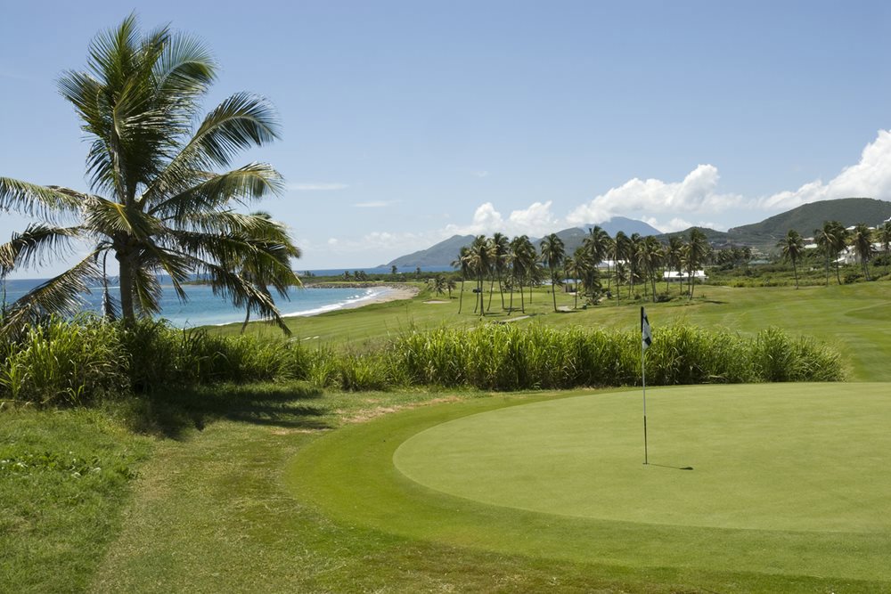 Enjoy the picturesque holes on this course that reach to the Caribbean Sea's calm waves and the Atlantic Ocean's black sand beaches