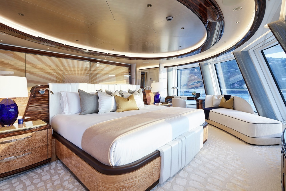 The master suite bedroom is forward on a private deck with spectacular views