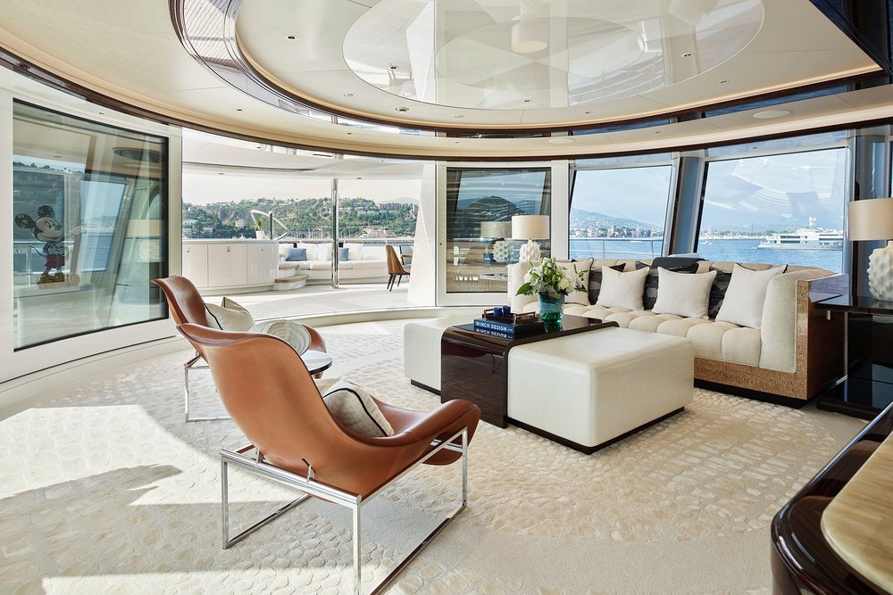 The owner's lounge overlooks a private terrace with jacuzzi, sunpads and an intimate dining area