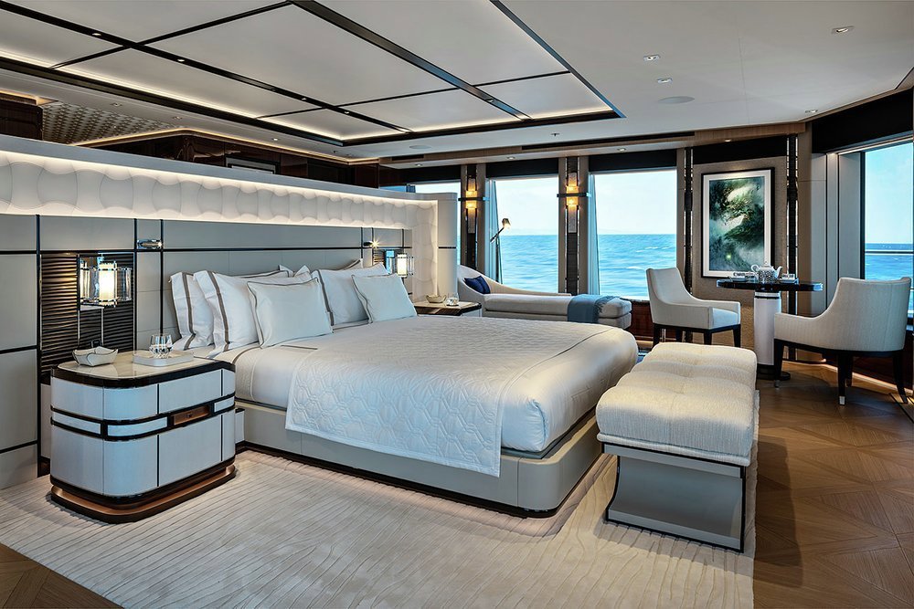 Wraparound views in the owner's suite, aft facing and overlooking a private terrace and jacuzzi with lounge and intimate dining