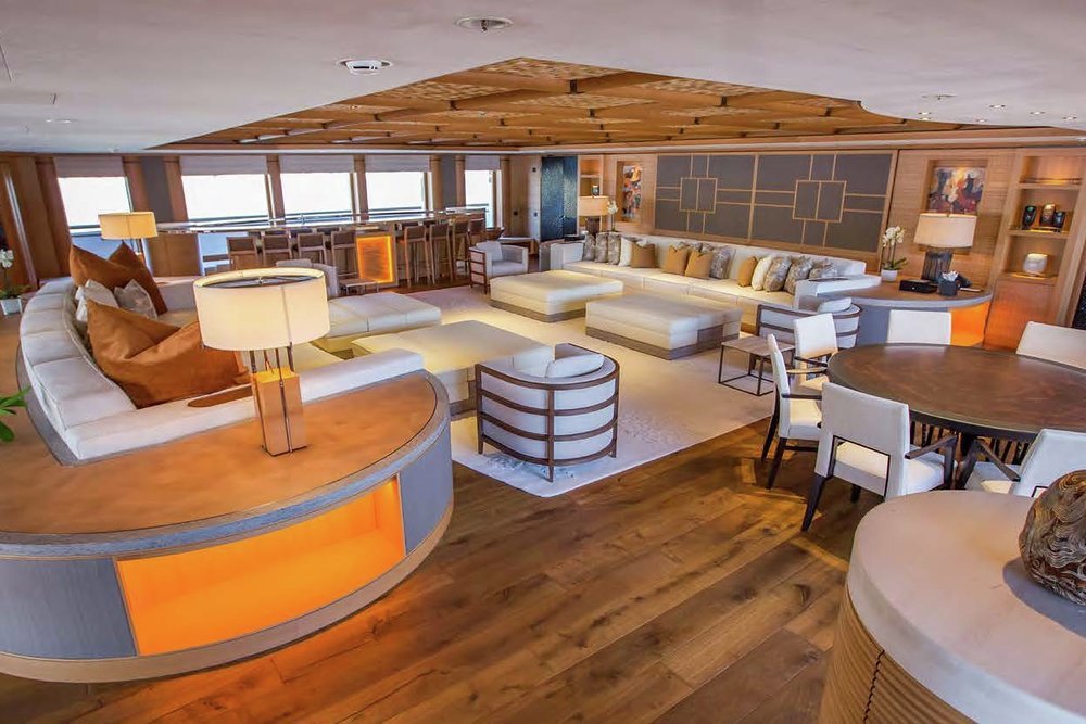 The upper deck's panoramic lounge has a huge sit-up bar