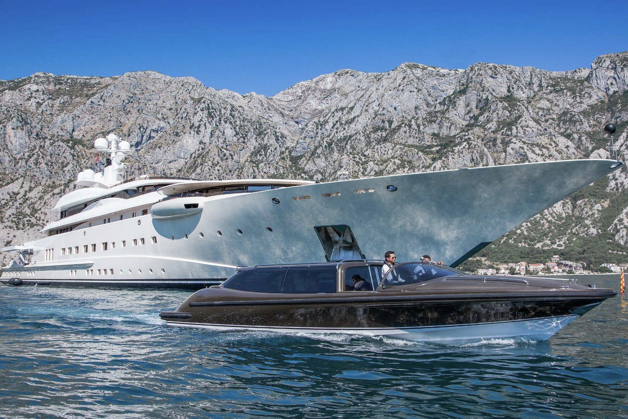 The yacht's Vikal tenders are stowed behind shell doors on the main deck aft