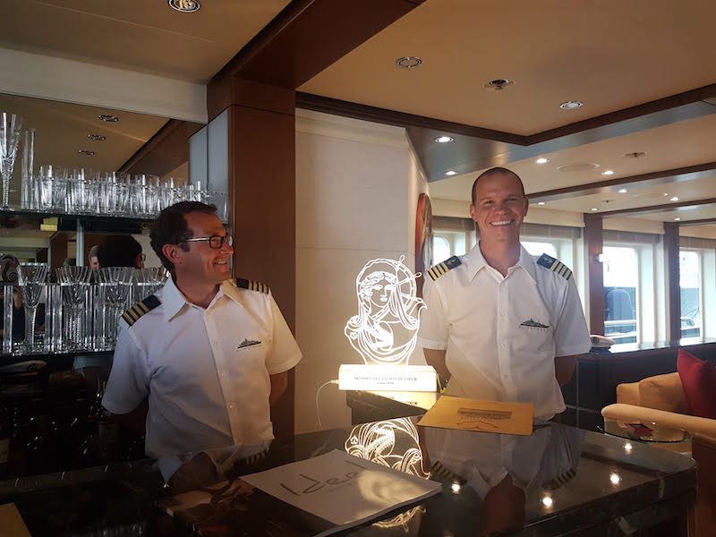 SLIPSTREAM's Captains Phil (left) and Steve with the 2018 Yachts du Coeur award