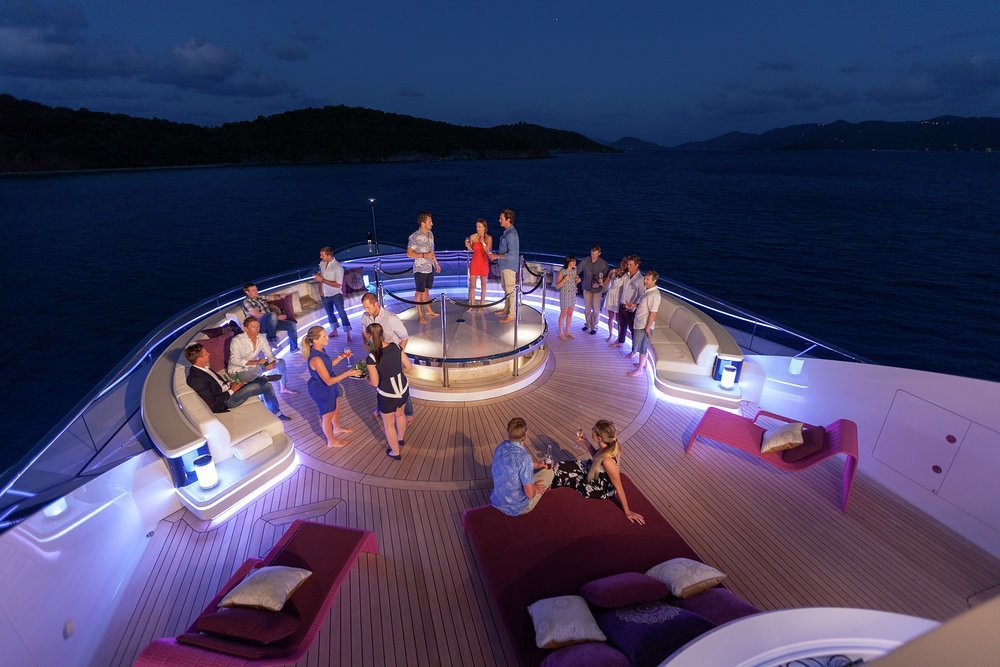 When night falls, the vibe changes from chilled pool party to serious dancing