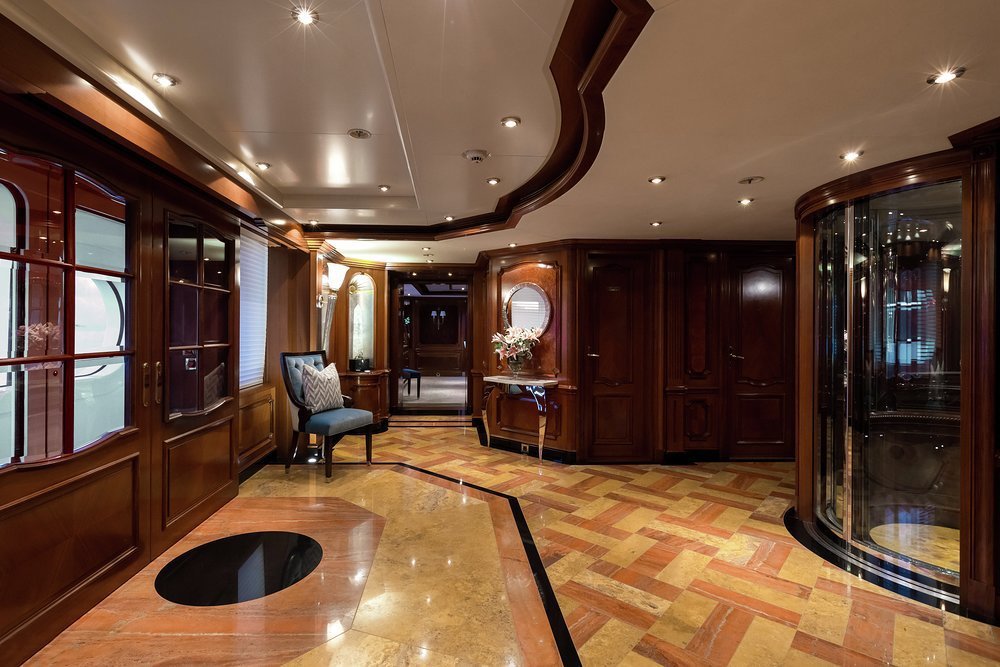 She has grand style, as seen here in the main deck elevator lobby, but she's never challenging