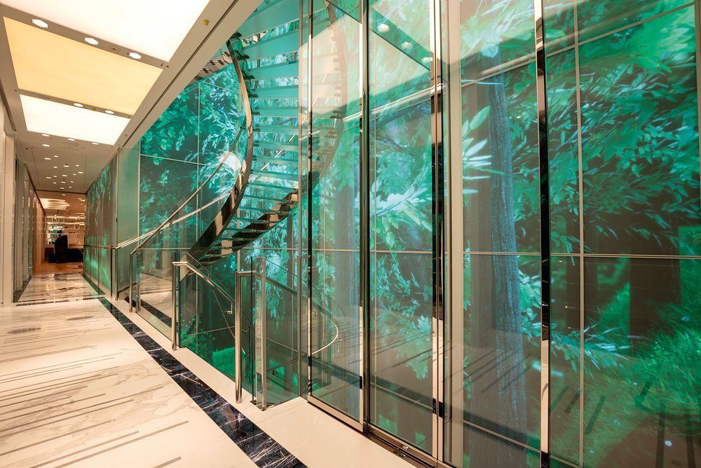 The interactive video wall rises five decks