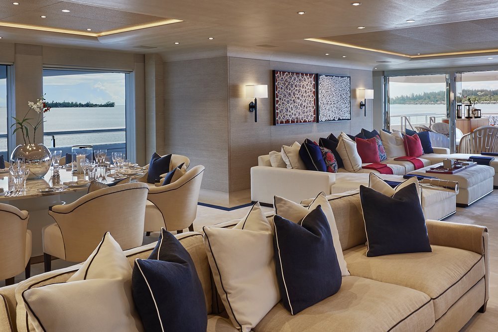 The owner's saloon with dining inside and out and multiple lounge areas