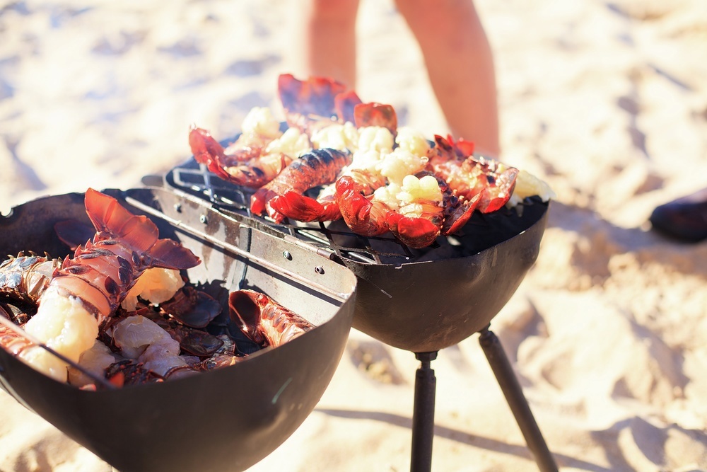 Chef will add your catch to the grill