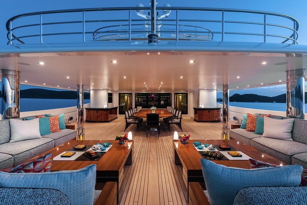 The main deck aft features open air dining and a lounge area, another huge entertaining space that also delivers an intimate family feel