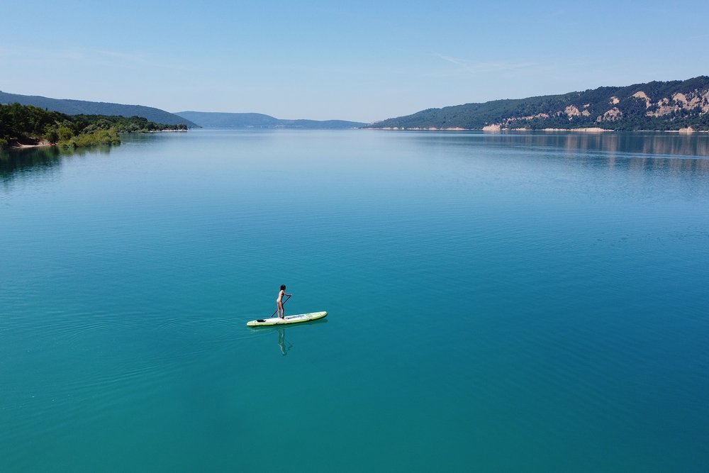 You may choose to take your pleasures in a more leisurely way, paddling across one of the turquoise lakes that temper the river's flow