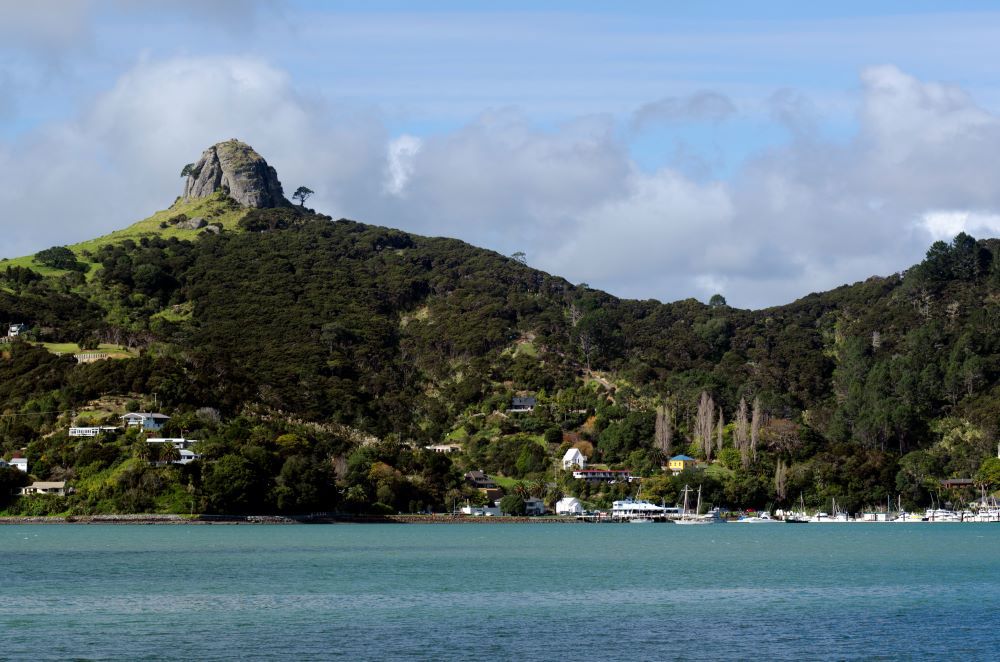 St Paul's Rock stands sentinel over Whangaroa Harbour